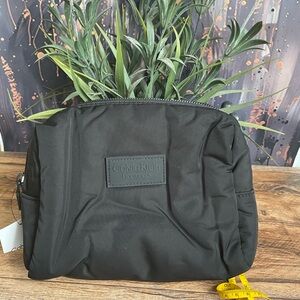 Calvin Klein Black cosmetic Men's Bag .
